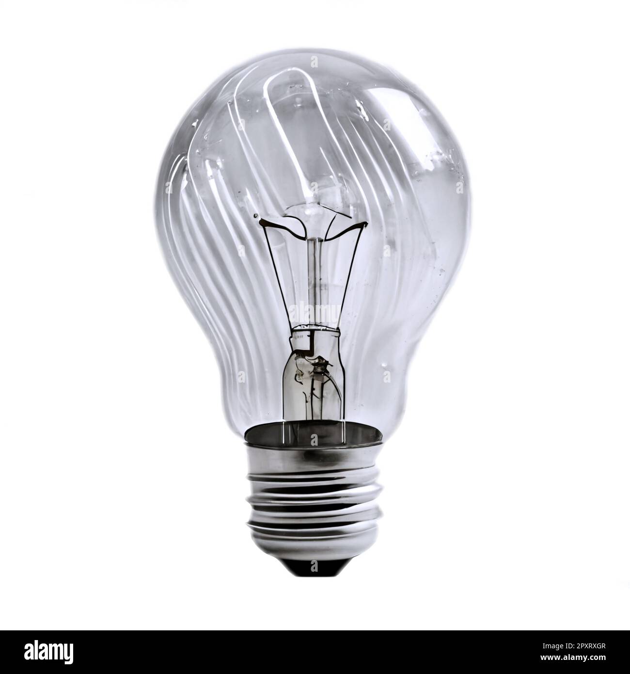 Clear incandescent light bulb isolated on white background. A turned
