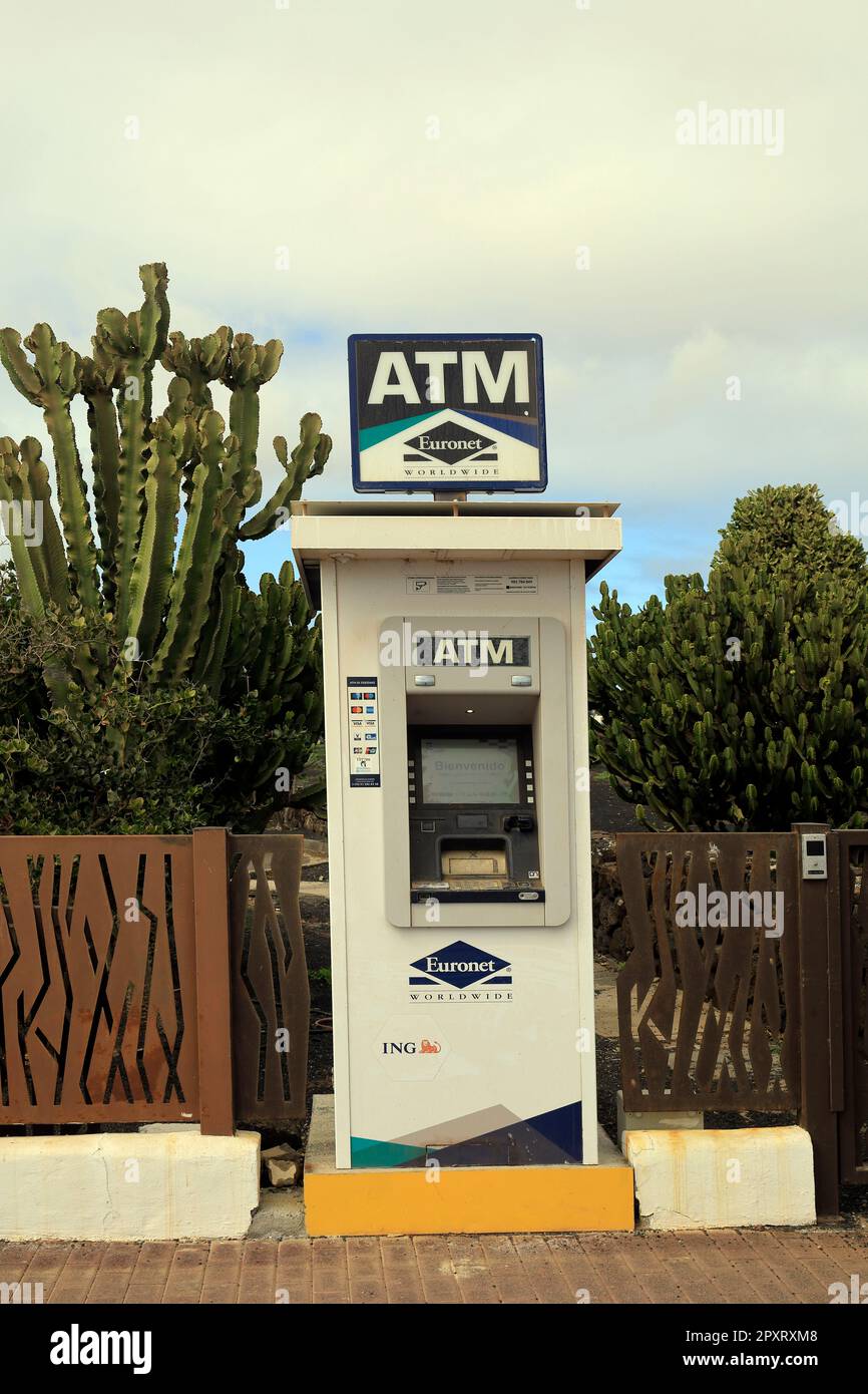 ATM cash withdrawal banking machine, Playa Blanca, Lanzarote Taken February 2023. cym Stock Photo