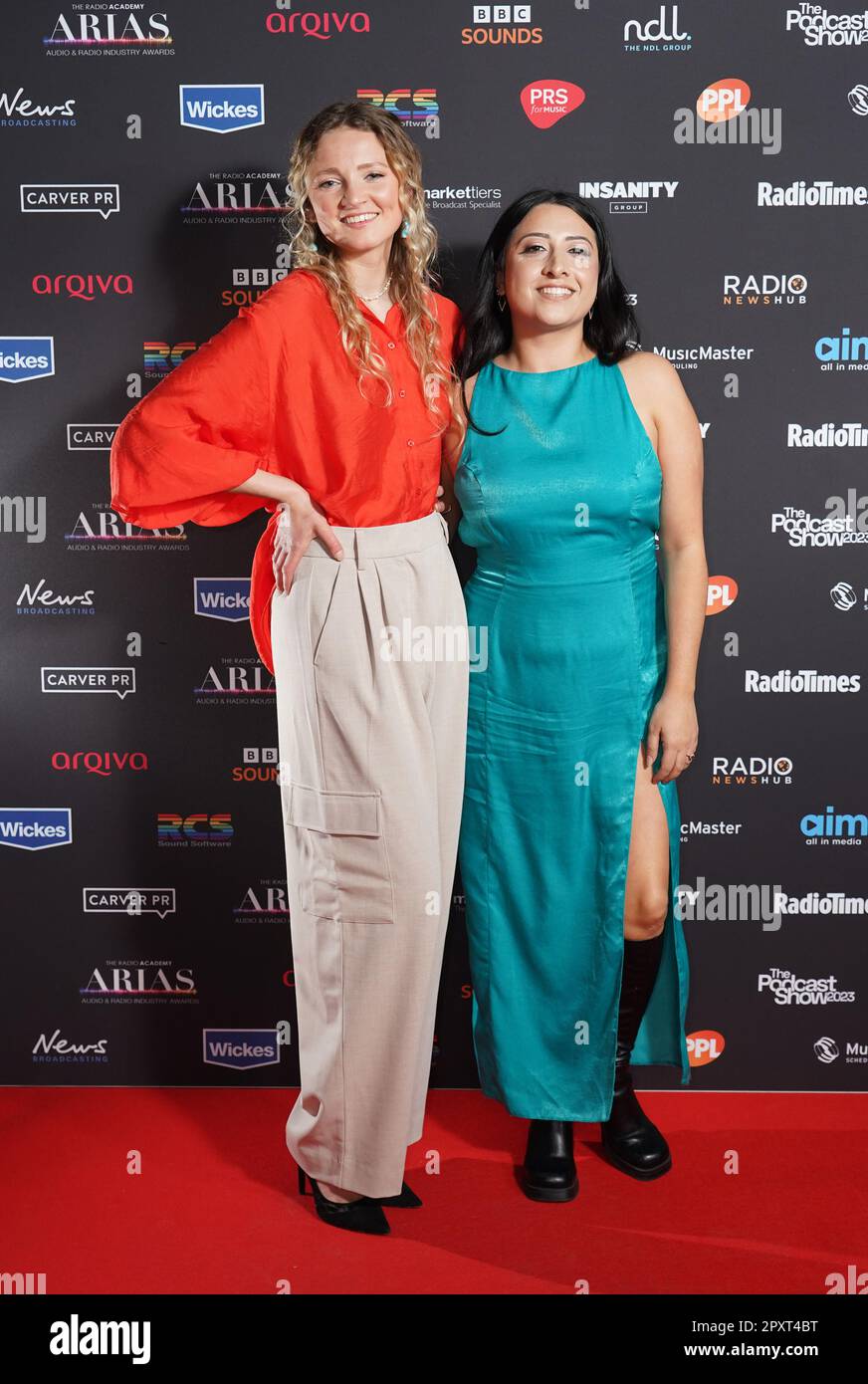 Mathilda Mallinson (left) and Helena Wadia attending the ARIAS - Audio and Radio Industry Awards, at the Theatre Royal Drury Lane, London. Picture date: Tuesday May 2, 2023. Stock Photo