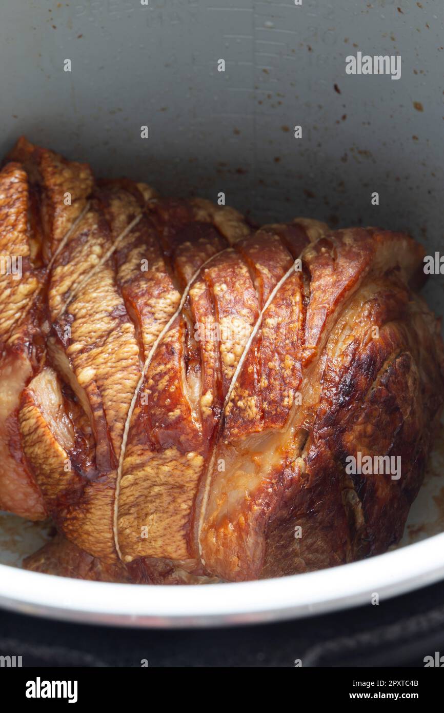 Pork shoulder joint of meat cooked in an air fryer. Healthy low cost