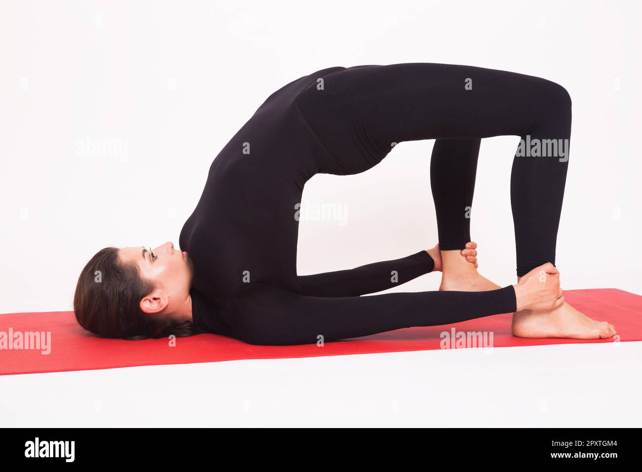 A black plus size female model in Dhyana yoga pose Stock Photo - Alamy