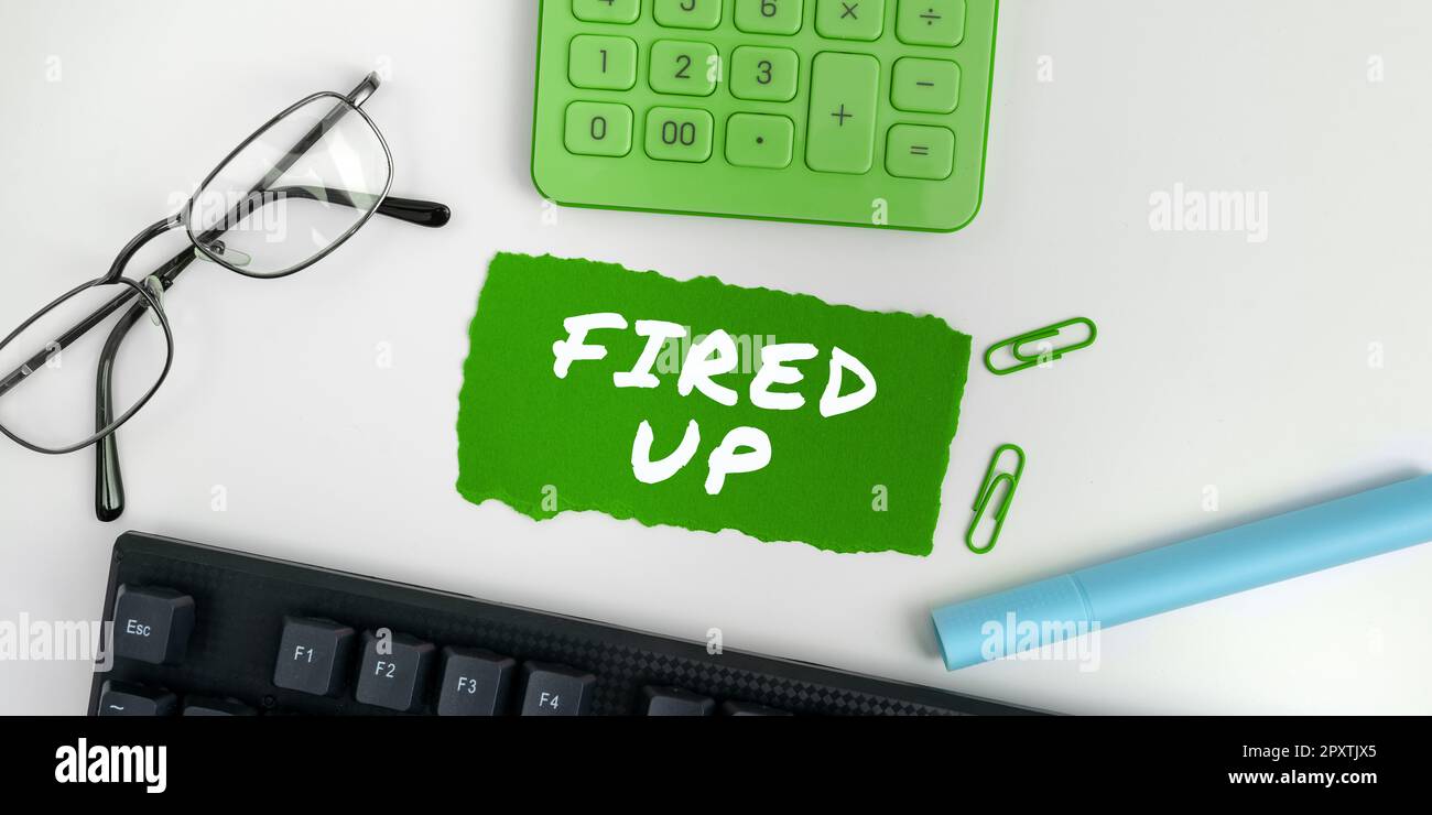 Hand writing sign Fired Up, Business showcase means that someone energized  and in excited state about event Stock Photo - Alamy