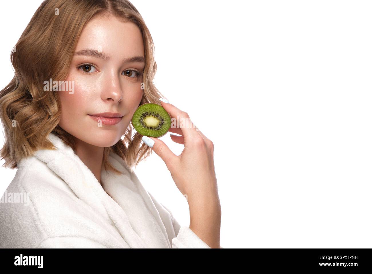 Beautiful tender young girl in a white coat with clean fresh skin ...