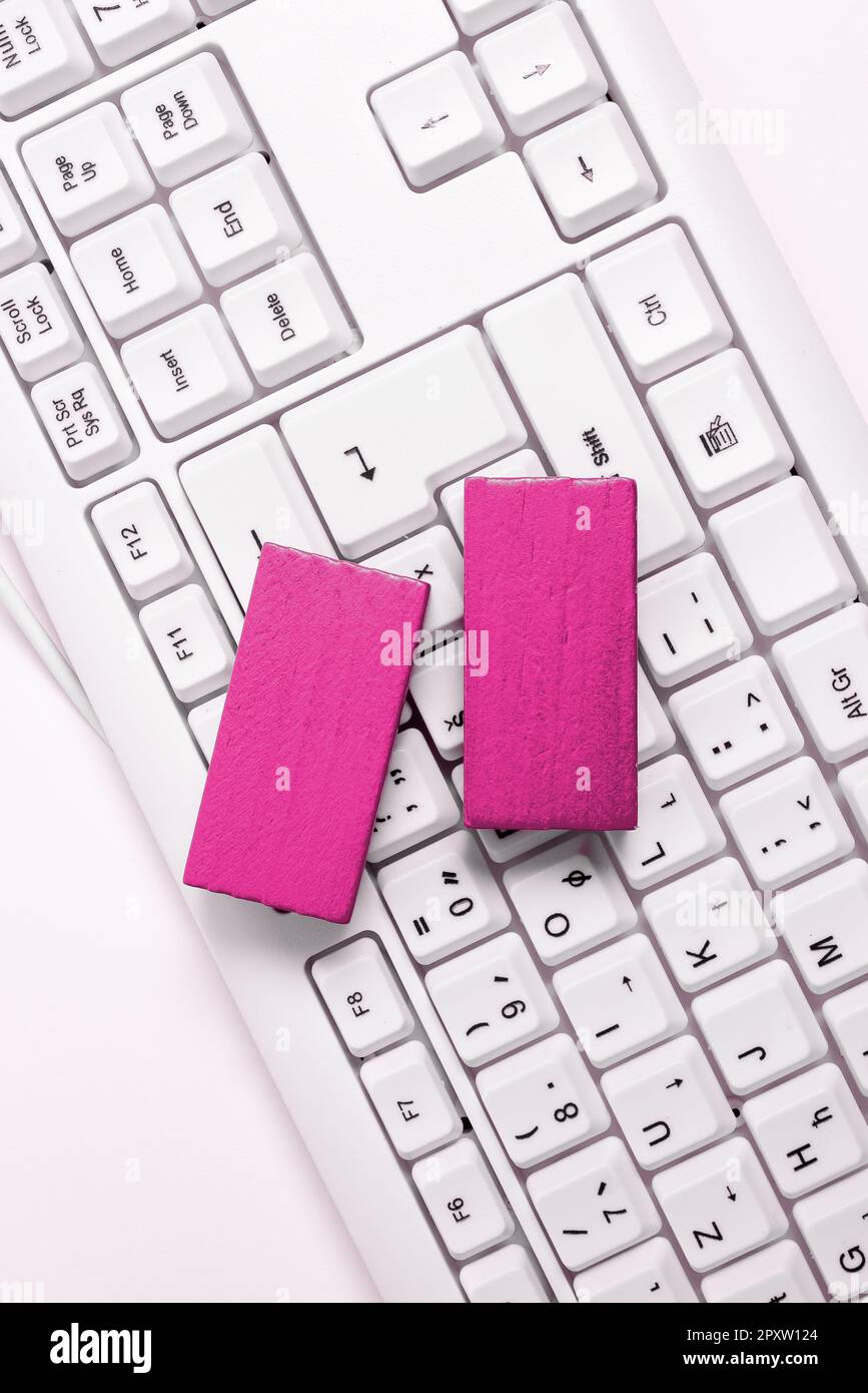 Colored cube with important message lying on keyboard. Main information. Stock Photo