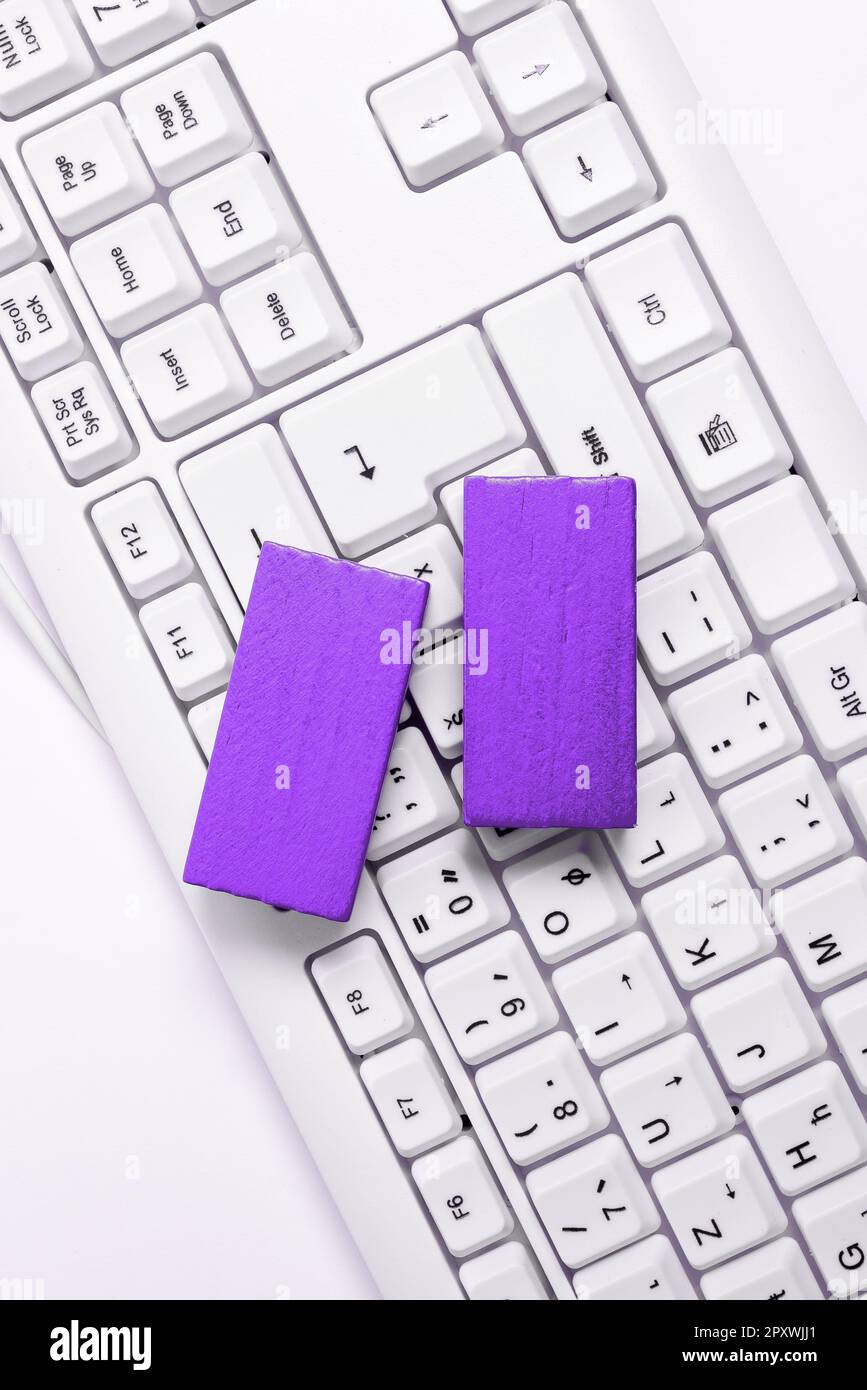 Colored cube with important message lying on keyboard. Main information. Stock Photo