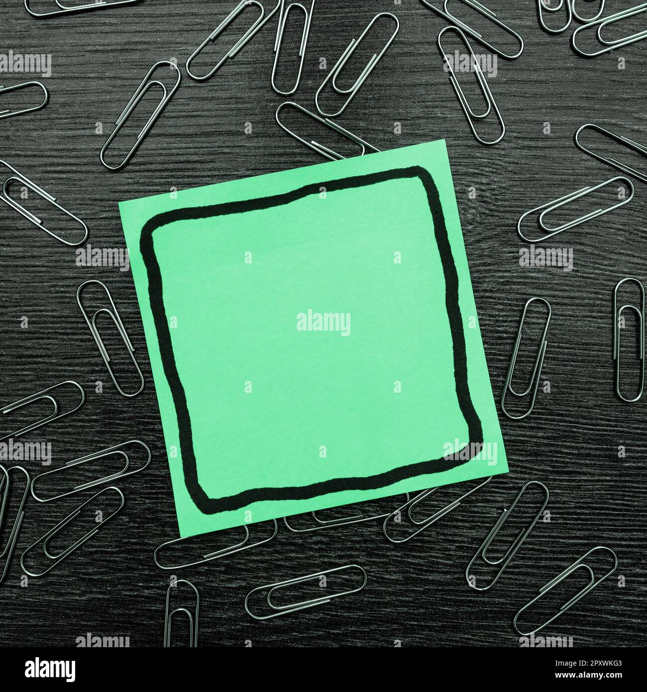 Paperclips Around Important Informations On Desk. Presented Recent Updates. Stock Photo