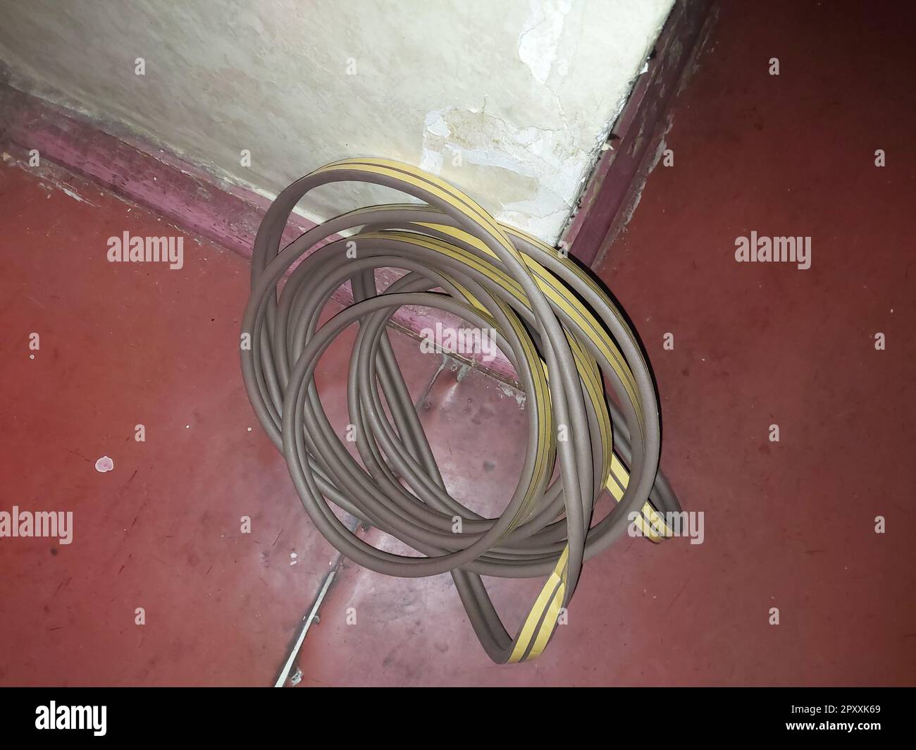 Installing a door seal against drafts and the odors Stock Photo Alamy