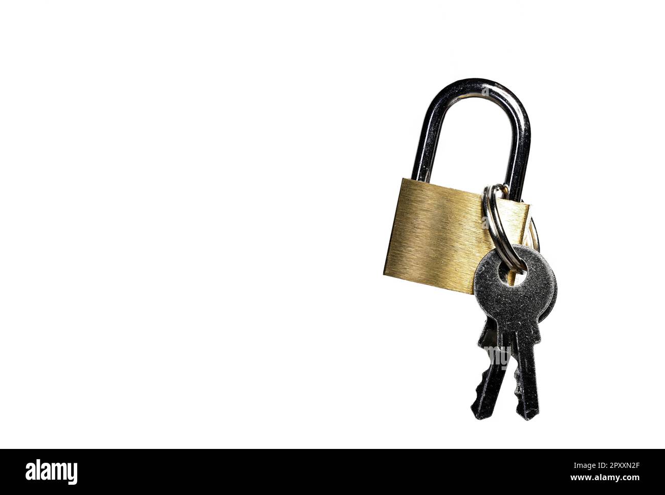 Close up of small brass gold metal steel padlock shackle lock with