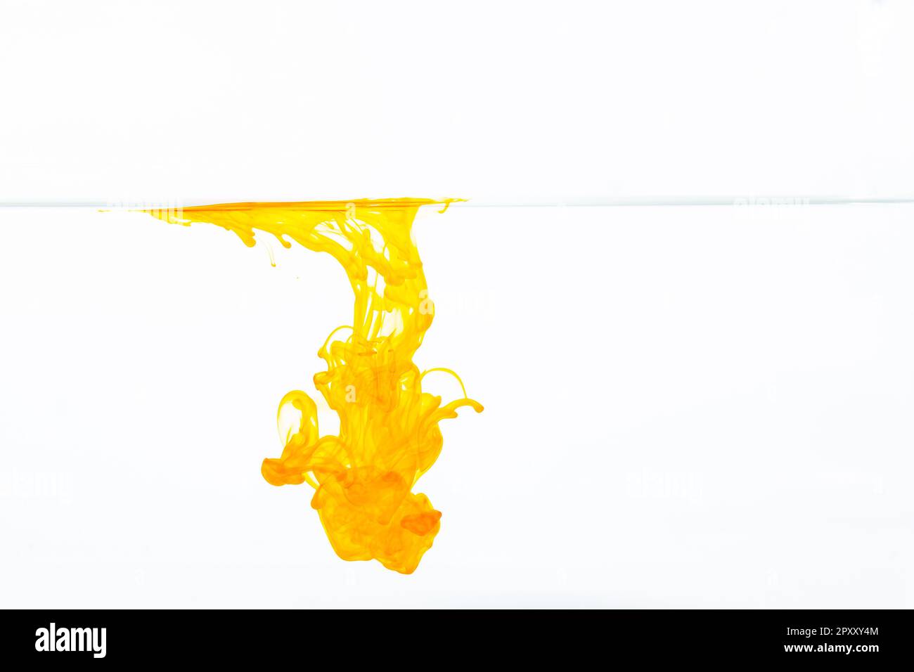 Orange ink drop in water, abstract orange ink in water on white ...