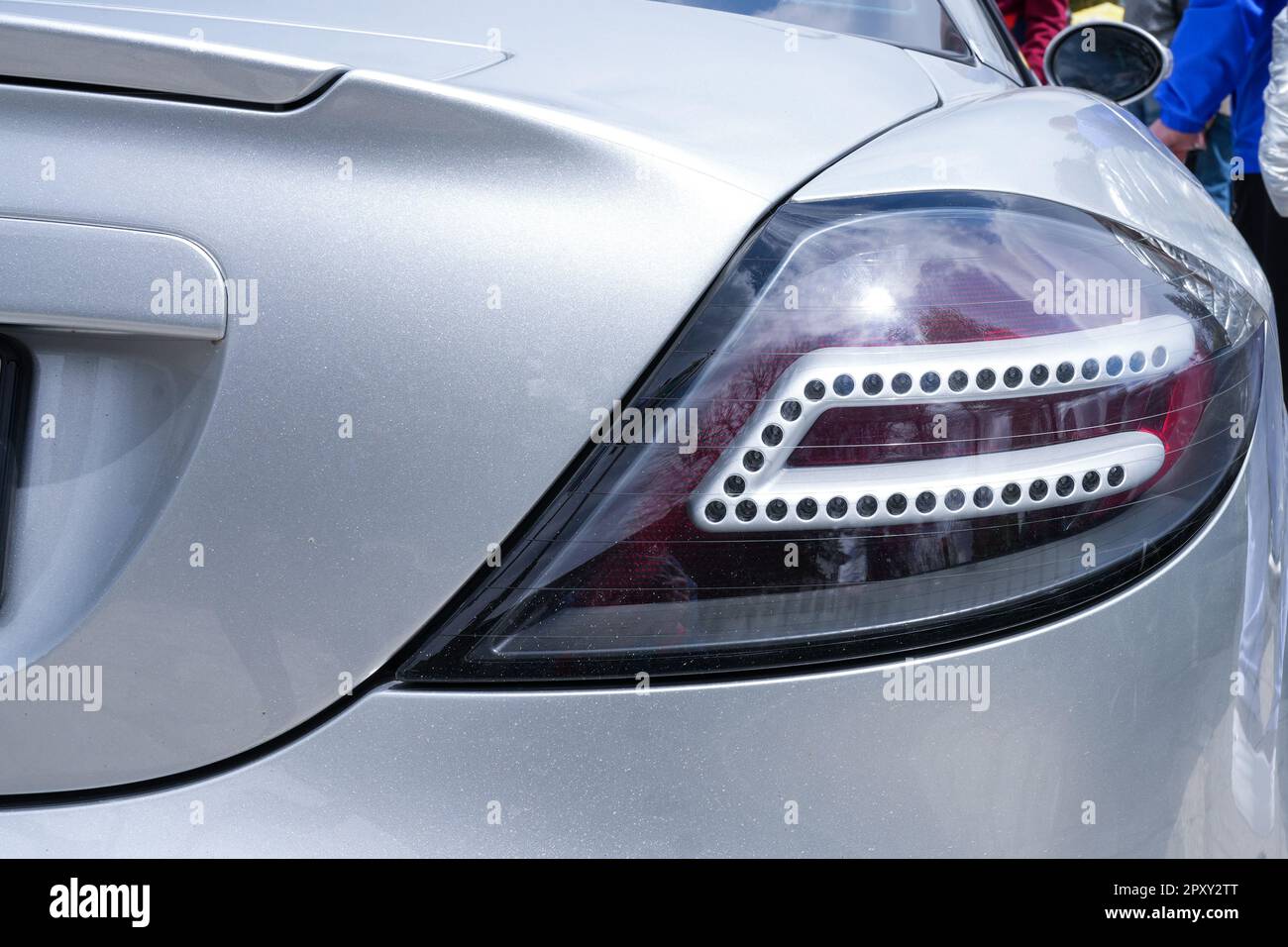 The rear light of a silver Mercedes SLR Stock Photo - Alamy