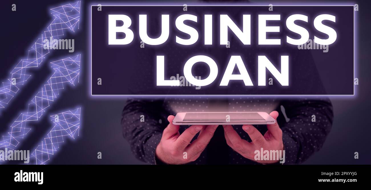Hand writing sign Business Loan, Business concept Credit Mortgage Financial Assistance Cash Advances Debt Stock Photo