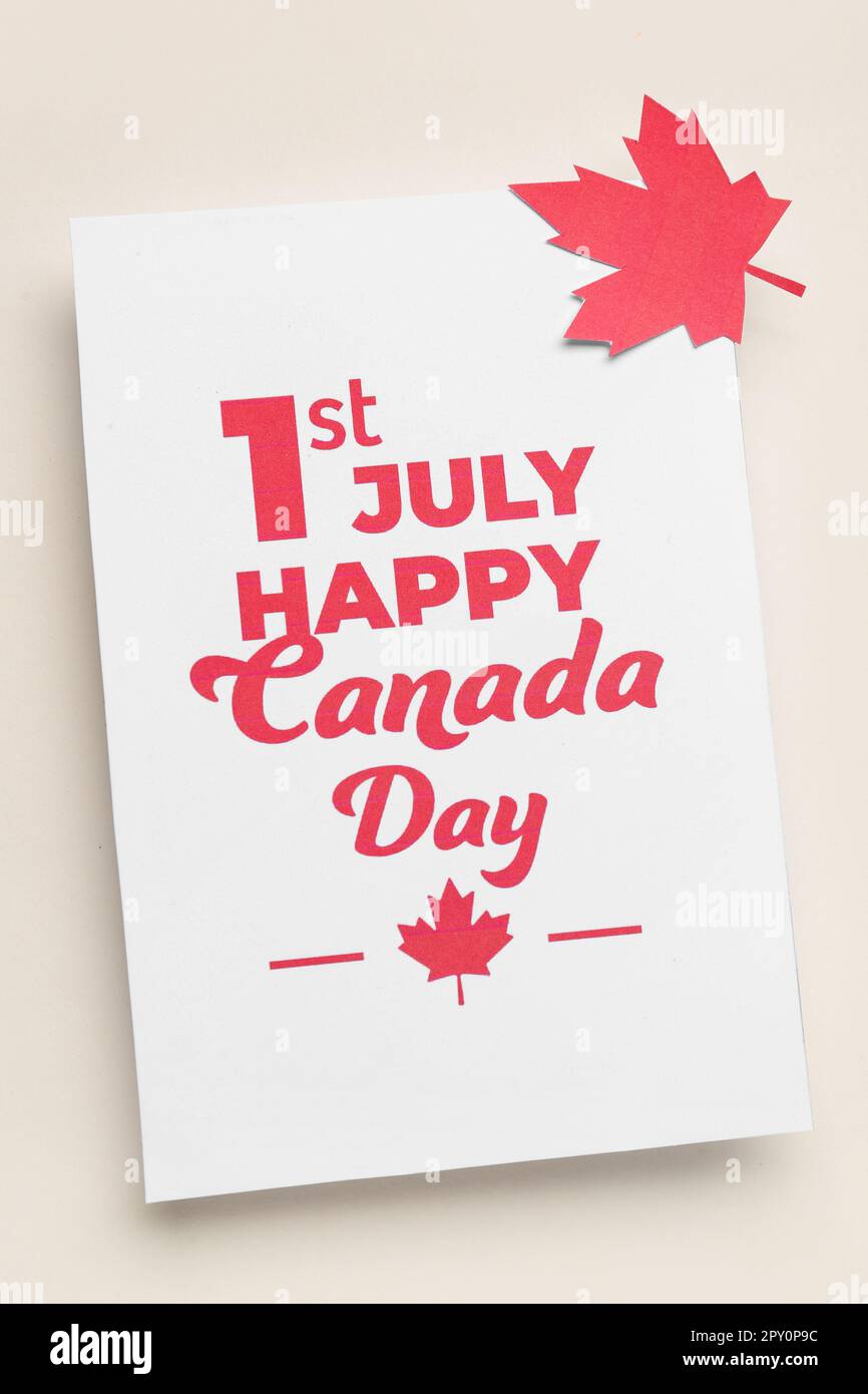 Card with text 1ST JULY HAPPY CANADA DAY and maple leaf on white ...