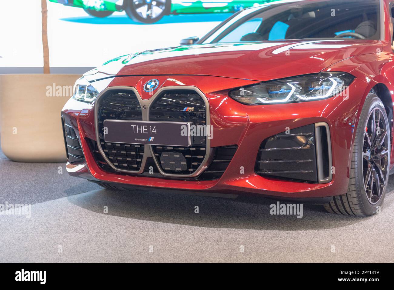 Gothenburg, Sweden - december 05 2021: Red 2022 BMW i4 M50 on display. Stock Photo