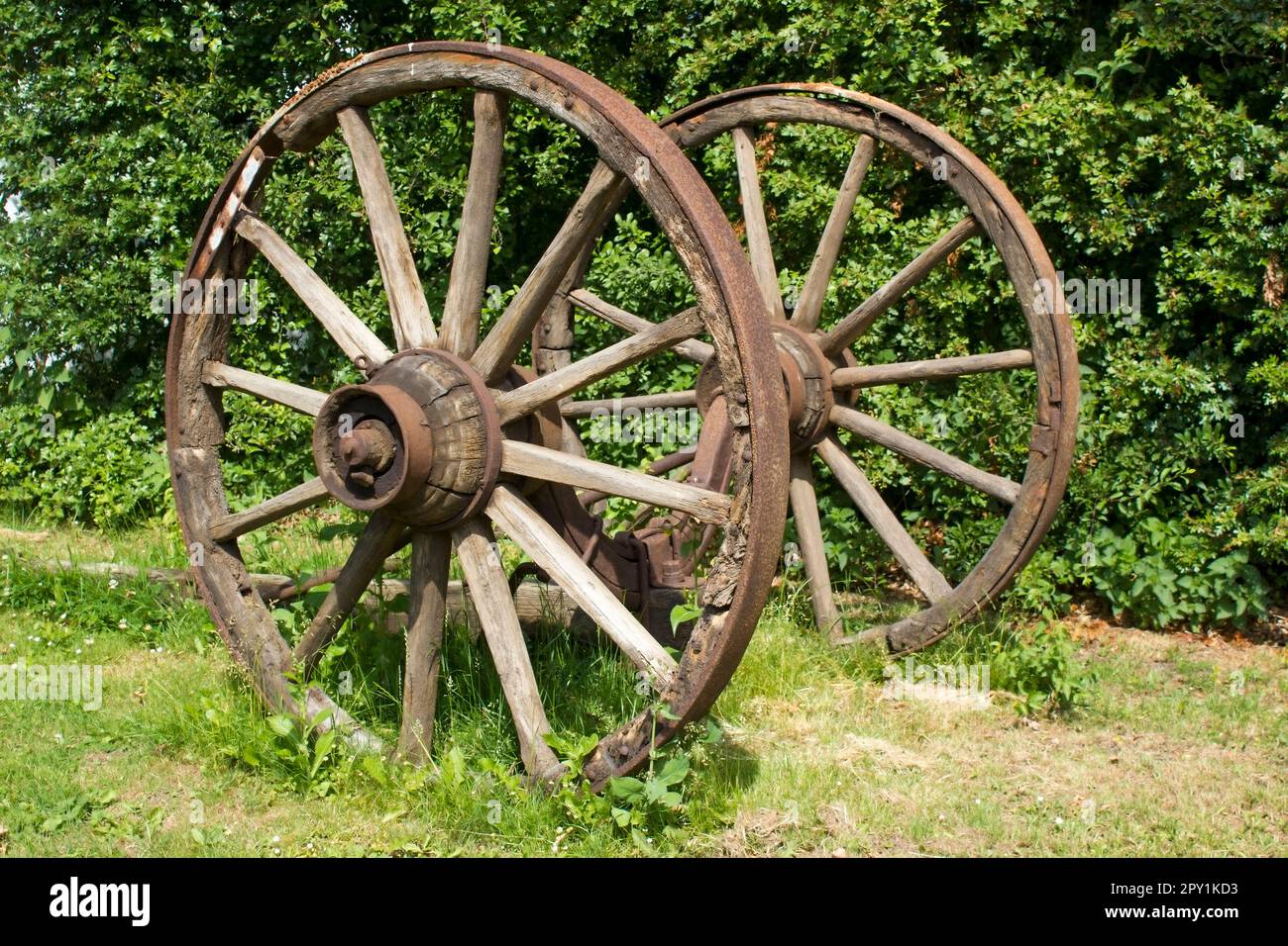 Rural wagon wheels in a garden close up Stock Photo Alamy