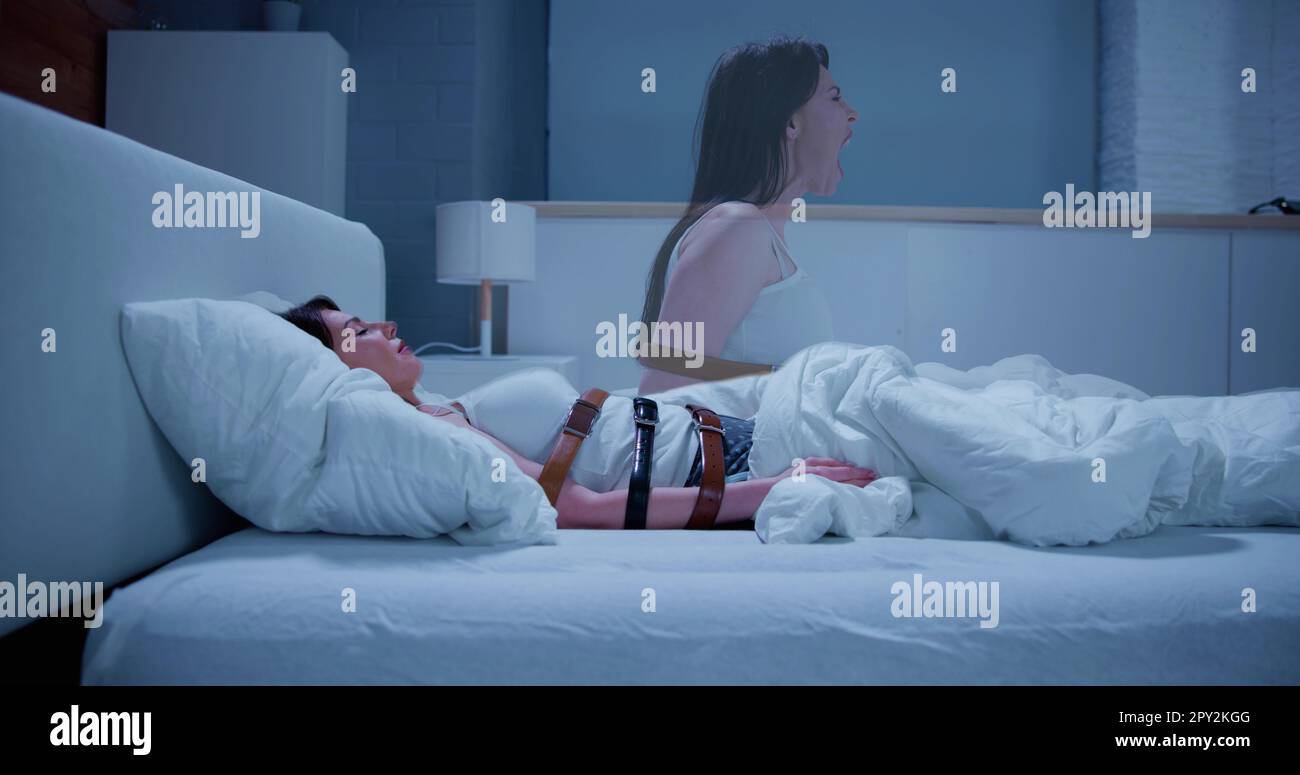 Woman Suffering From Sleep Paralysis At Home Stock Photo - Alamy