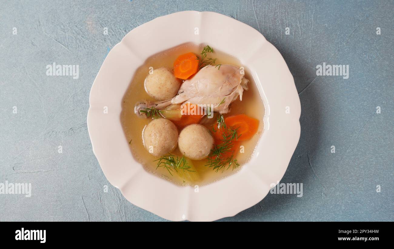 Jewish chicken broth with kneidlach (balls made with matzo meal). Matzo