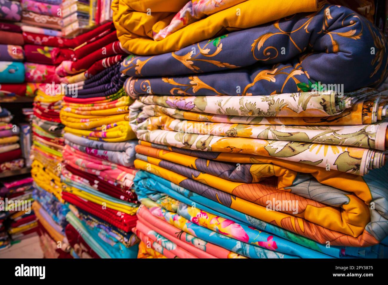 Artistic variety shade tone colors Bed sheets stacked on retail Shop ...