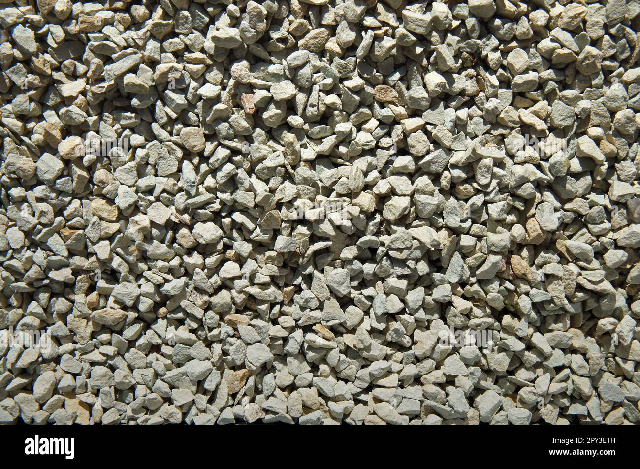 Crushed zeolite mineral. Fine gravel. Stock Photo