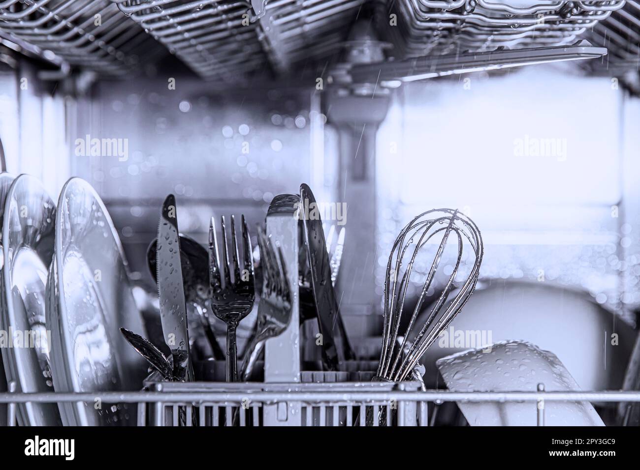 Front view of open automatic stainless steel builtin fully integrated