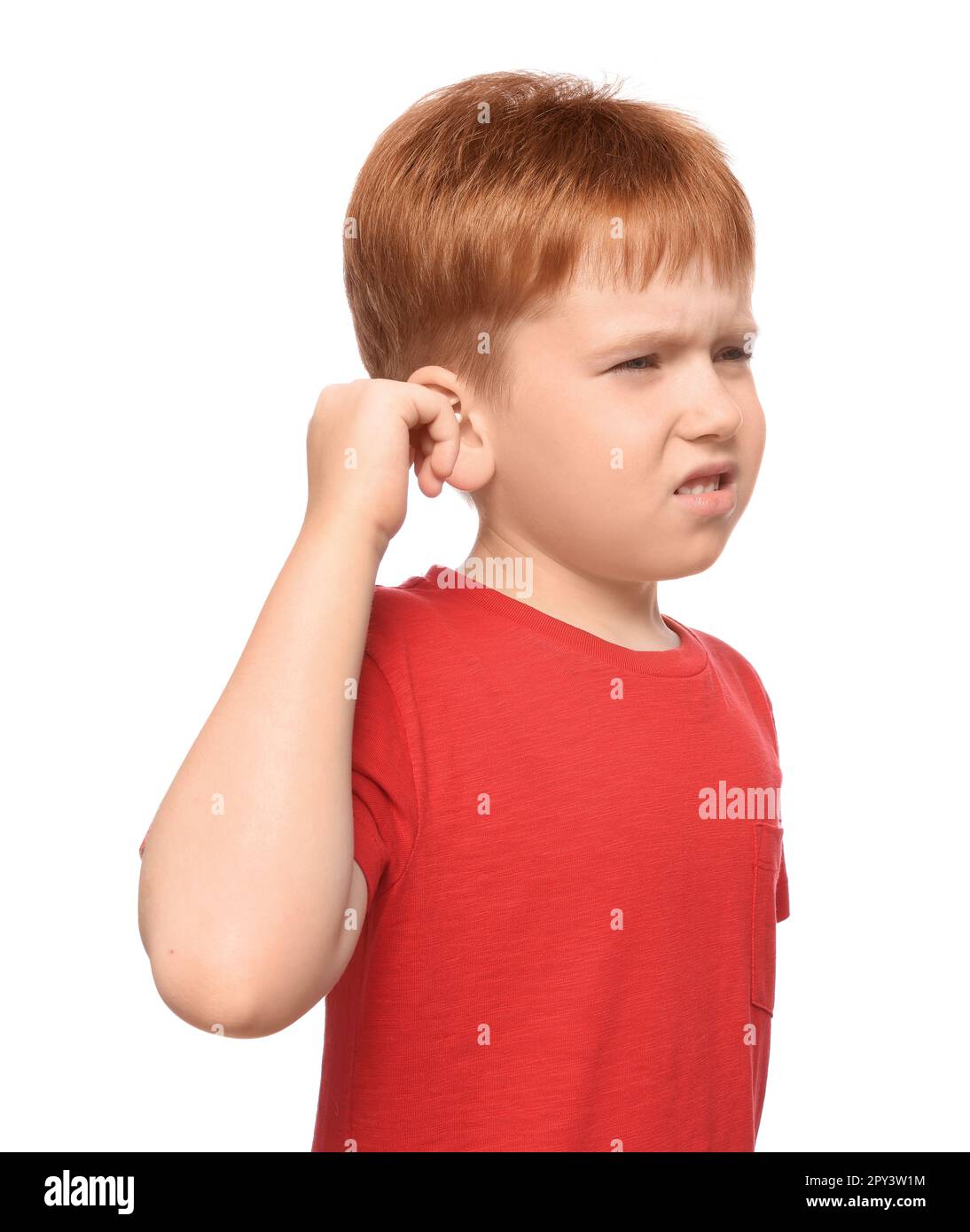 Little boy suffering from ear pain on white background Stock Photo Alamy