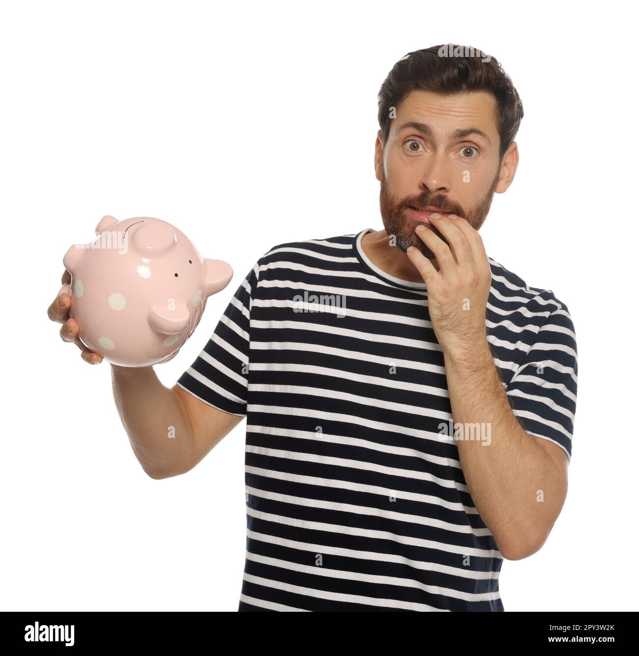 Man with ceramic piggy bank on white background Stock Photo - Alamy
