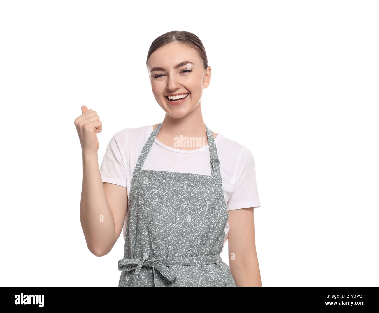 Beautiful young woman in clean apron on white background Stock Photo ...