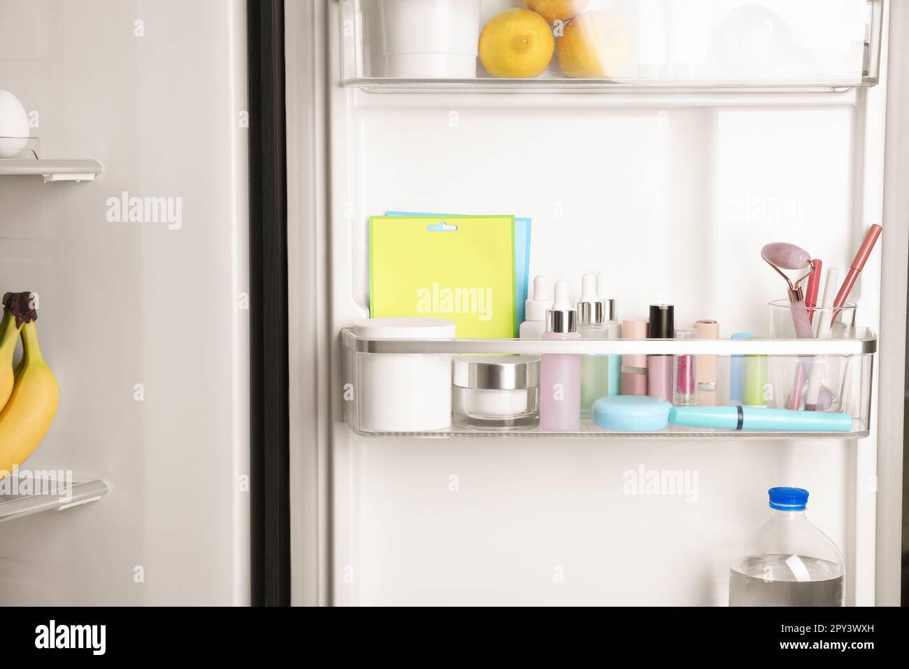 Storage of cosmetics and tools in refrigerator door bin Stock Photo Alamy