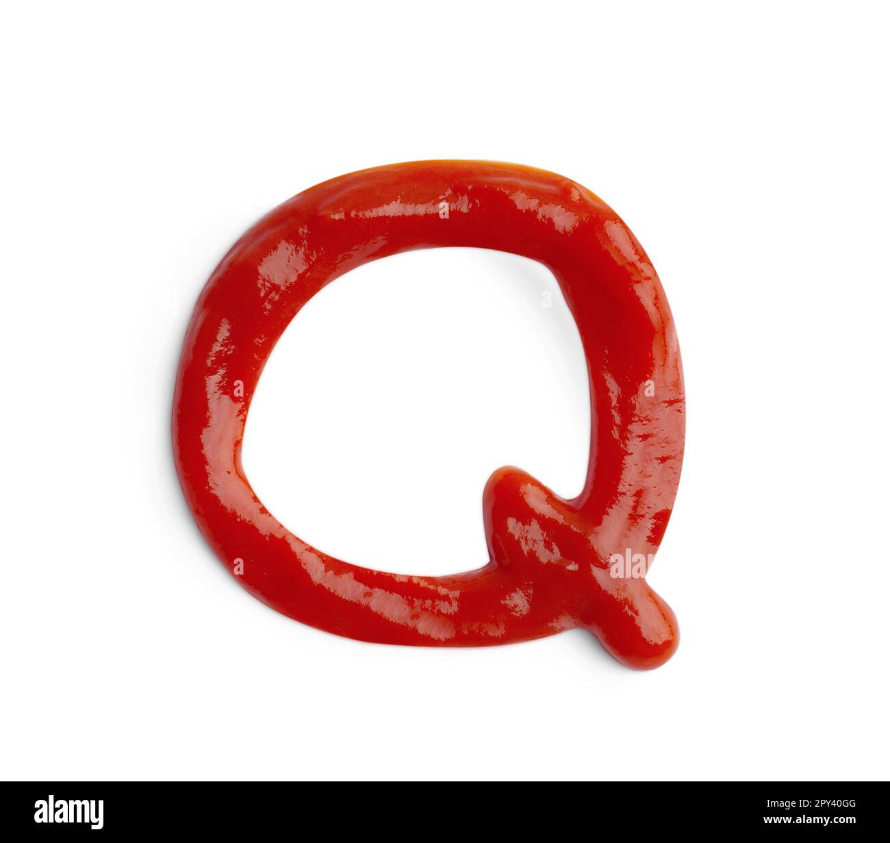 Letter Q written with ketchup on white background Stock Photo