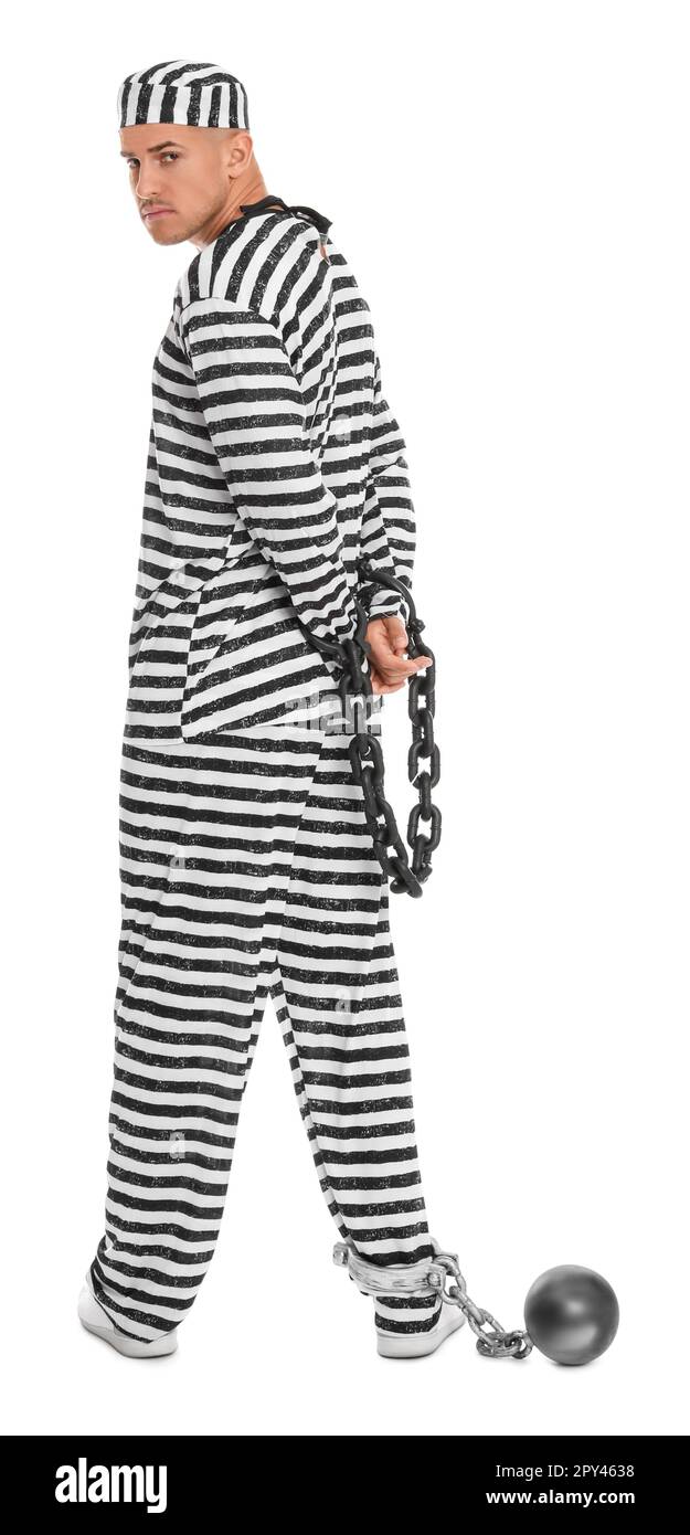 Prisoner in striped uniform with chained hands and metal ball on white background Stock Photo