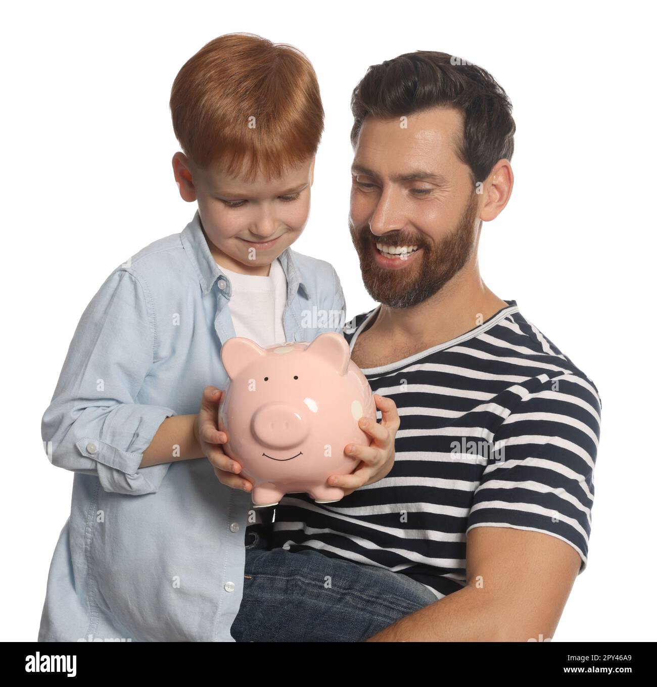 Father and his son with ceramic piggy bank on white background Stock ...