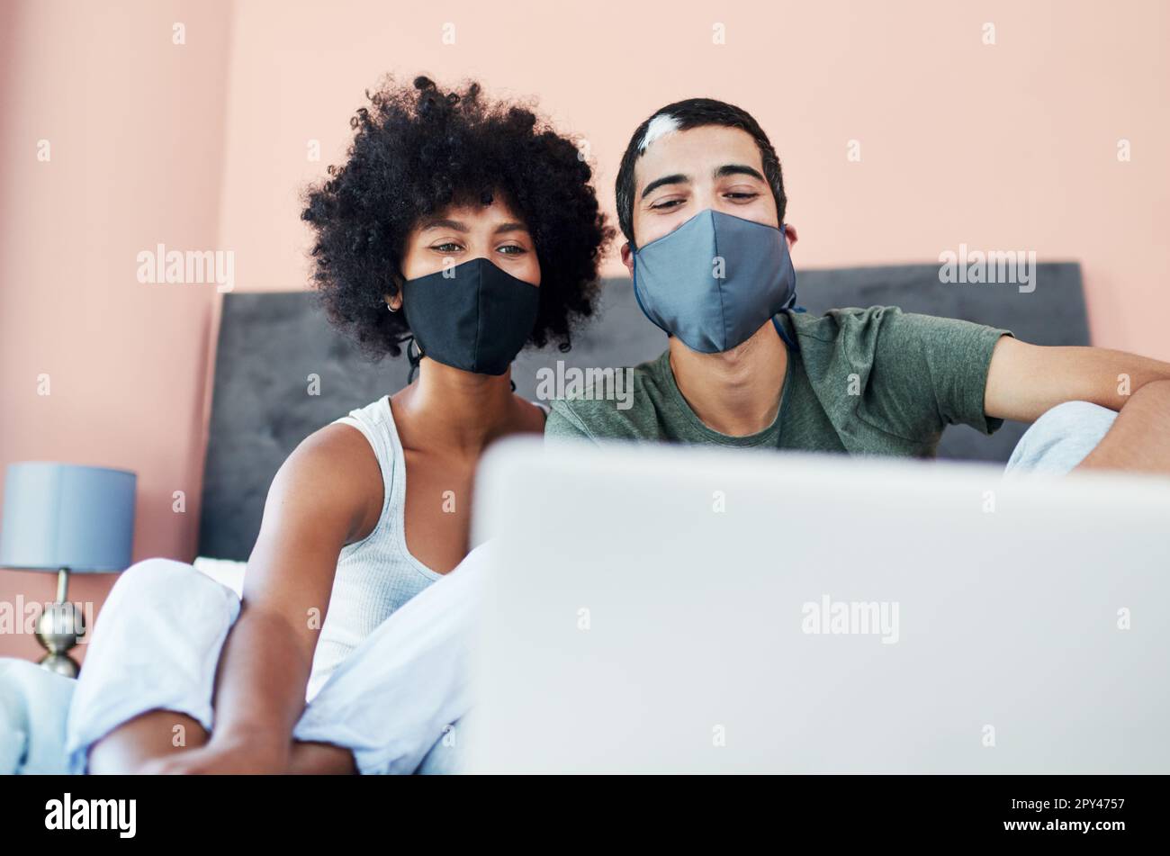 Married couple in medical masks hi-res stock photography and images - Alamy