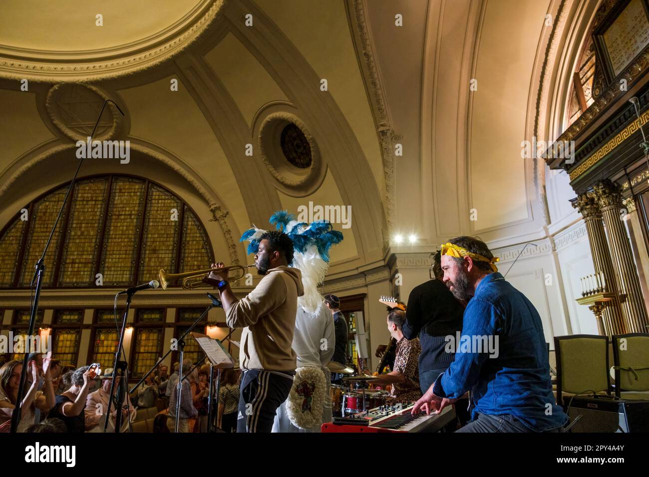 NEW ORLEANS, LA, USA - APRIL 28, 2023: Cha Wa band performs in the tabernacle of Touro Synagogue for Jazzfest Shabbat Stock Photo