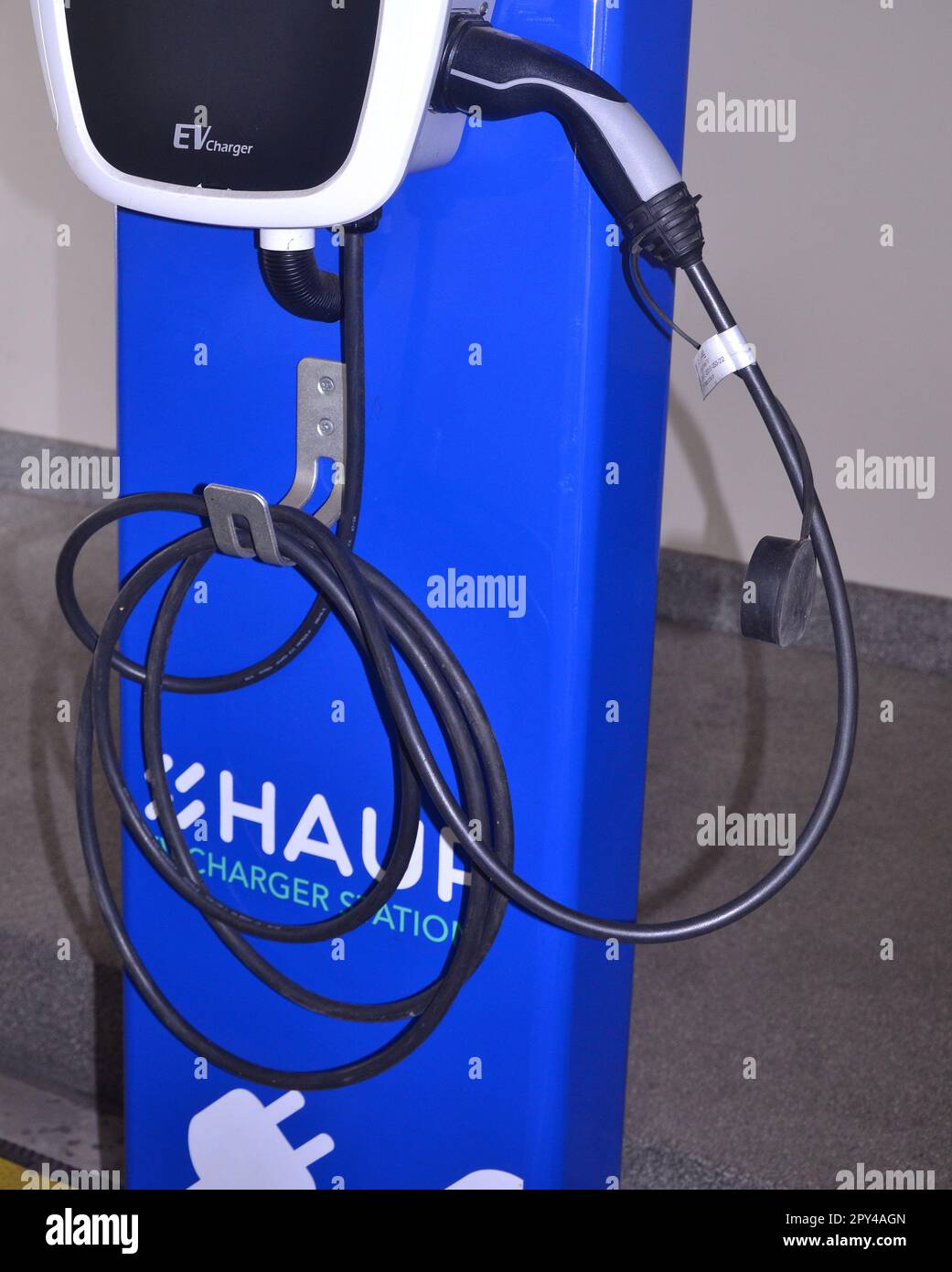 Electric vehicle ( EV ) battery charging station, named Haup, in Bangkok, Thailand. Stock Photo