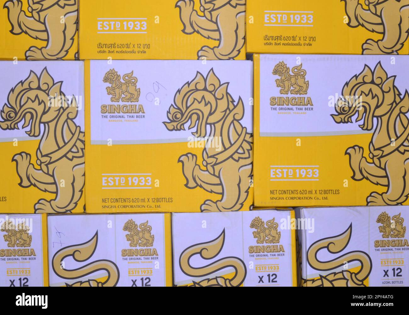 Multiple cardboard cases of beer, all Singha beer, a popular beer in Thailand, Asia. Stock Photo