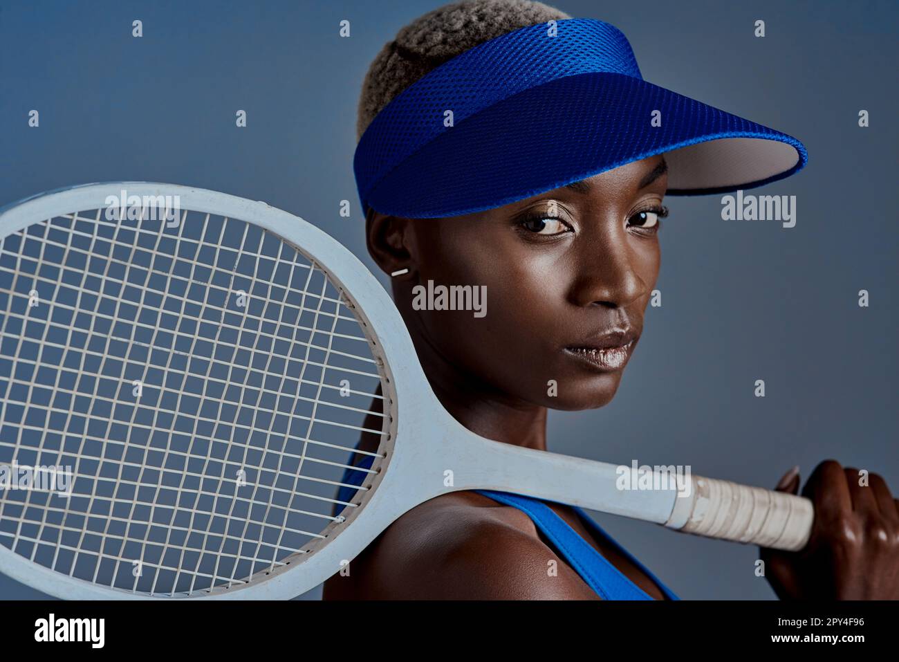 I let the racket do the talking. Studio shot of a sporty young woman ...