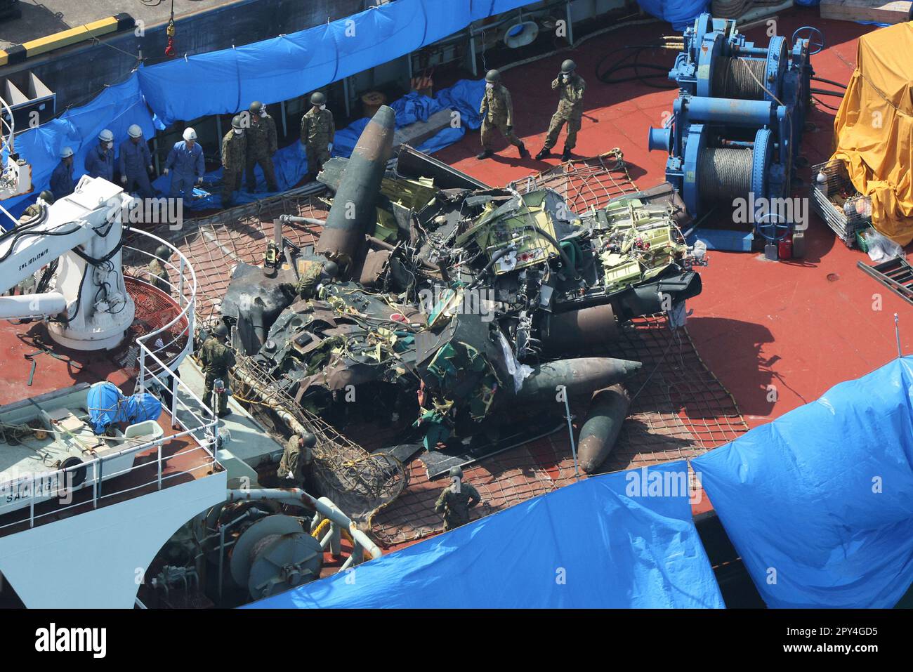An aerial photo shows the wreckage of a sunken helicopter of the Japan ...