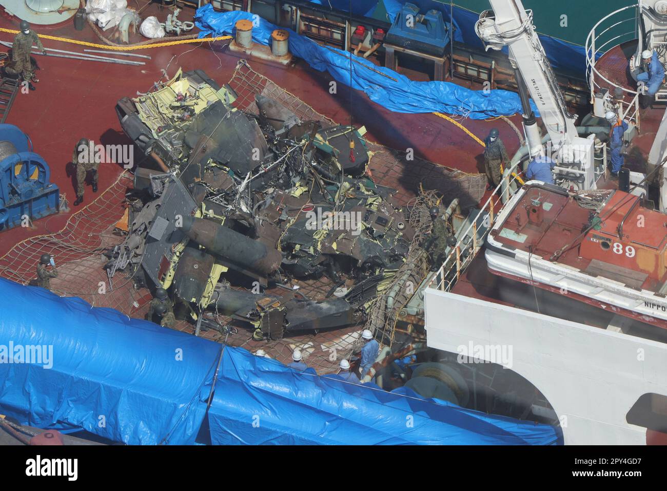 An aerial photo shows the wreckage of a sunken helicopter of the Japan ...