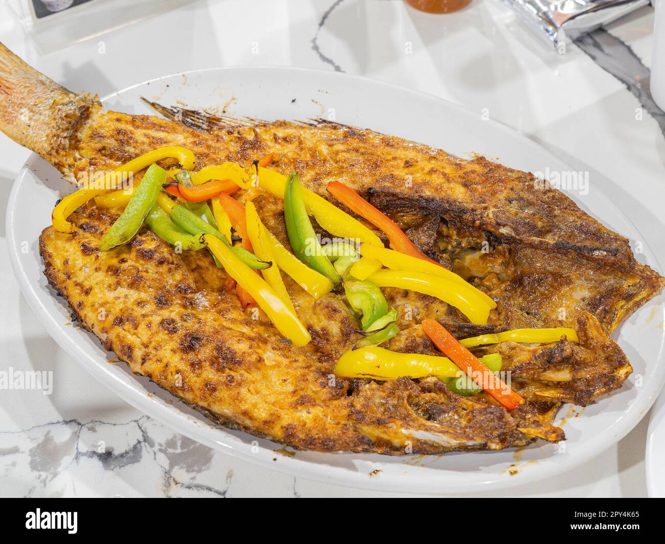 Close up shot of Mexician style fried fish at Mexico Stock Photo