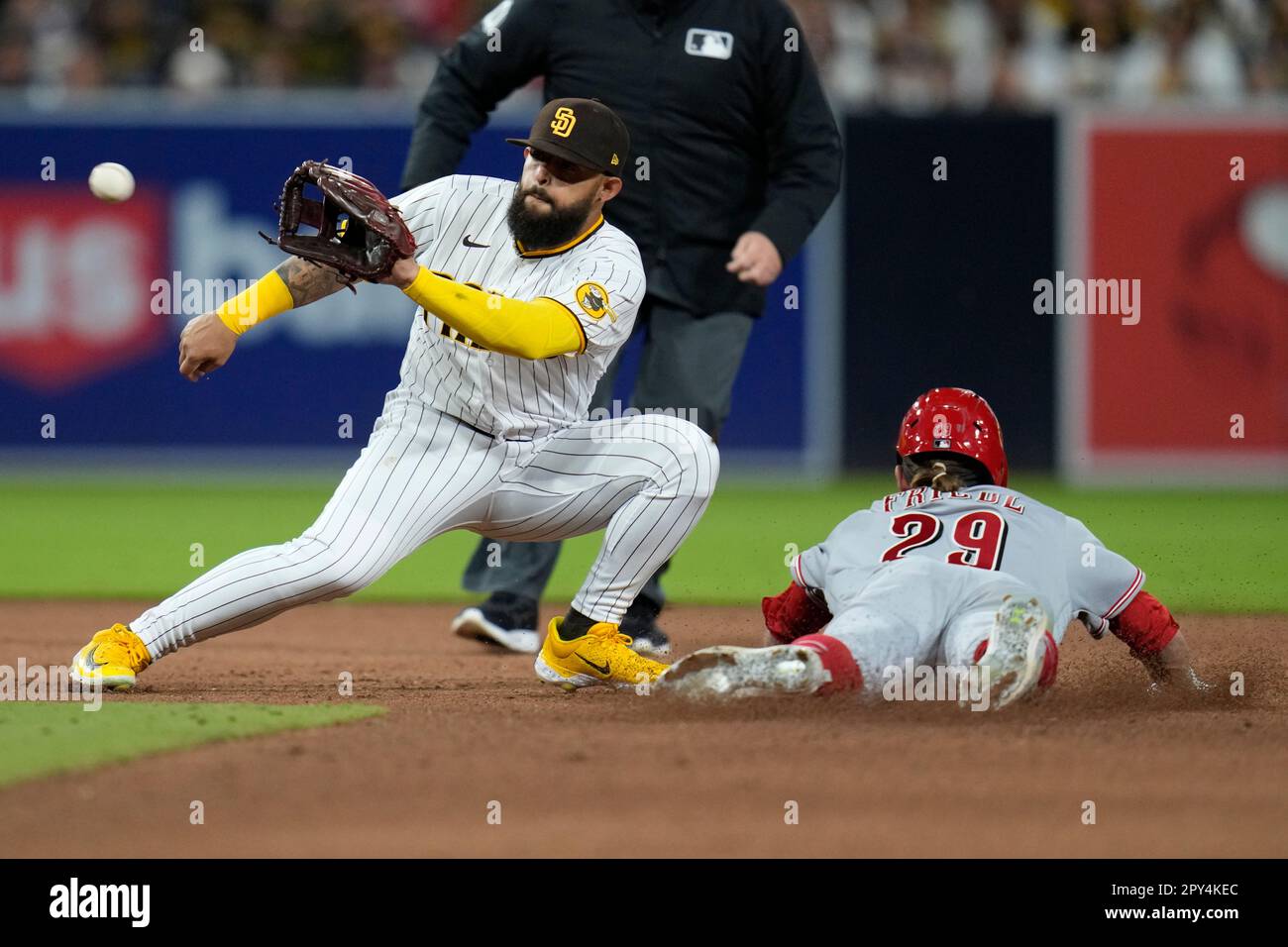 Cincinnati Reds' TJ Friedl (29) safely steals second base as San Diego ...