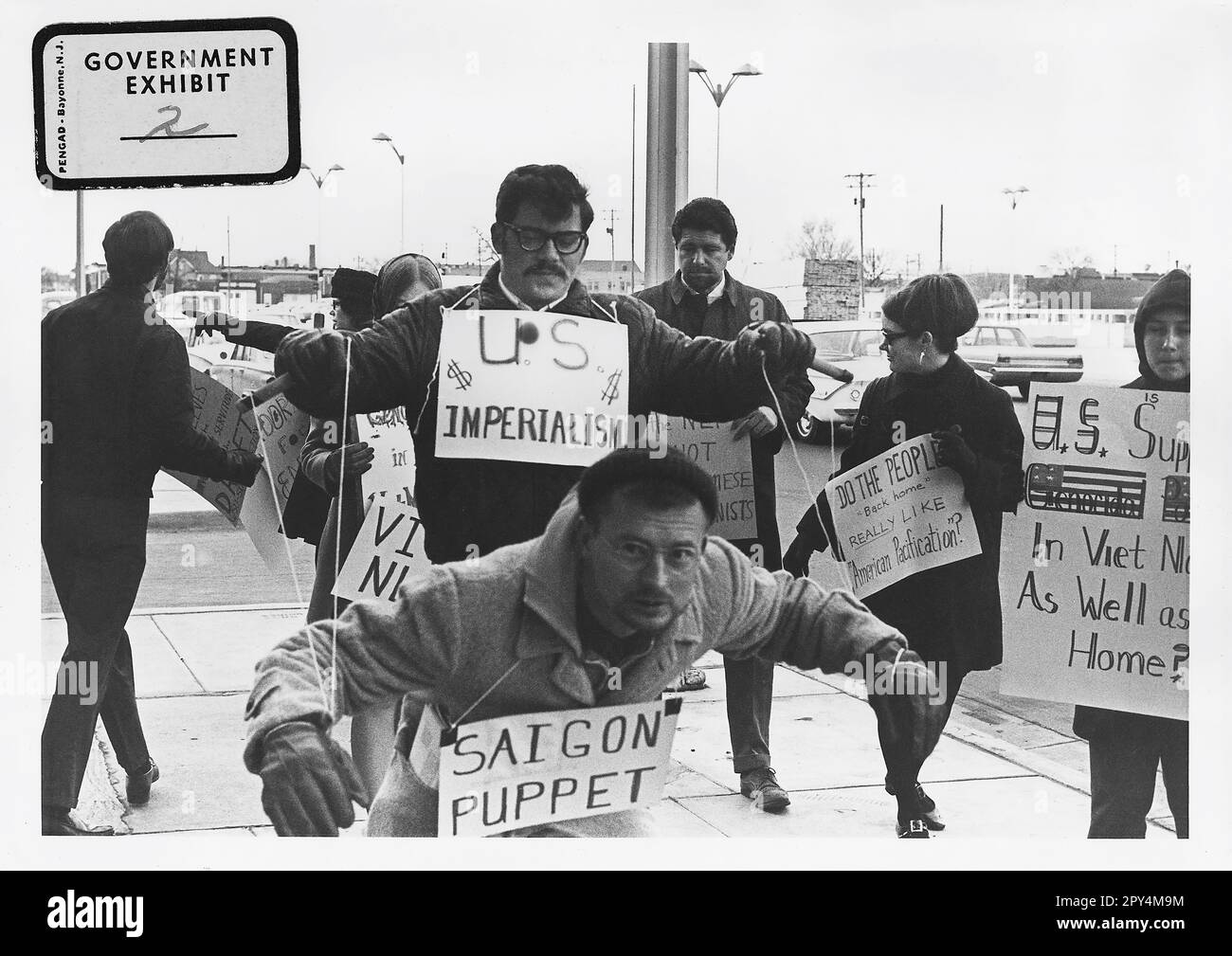 USA: Vietnam War and anti-imperialist protestors in Wichita, Kansas, 1967.  The Second Indochina War, known in America as the Vietnam War, was a Cold War era military conflict that occurred in Vietnam, Laos, and Cambodia from 1 November 1955 to the fall of Saigon on 30 April 1975. This war followed the First Indochina War and was fought between North Vietnam, supported by its communist allies, and the government of South Vietnam, supported by the U.S. and other anti-communist nations. The U.S. government viewed involvement in the war as a way to prevent a communist takeover of South Vietnam. Stock Photo