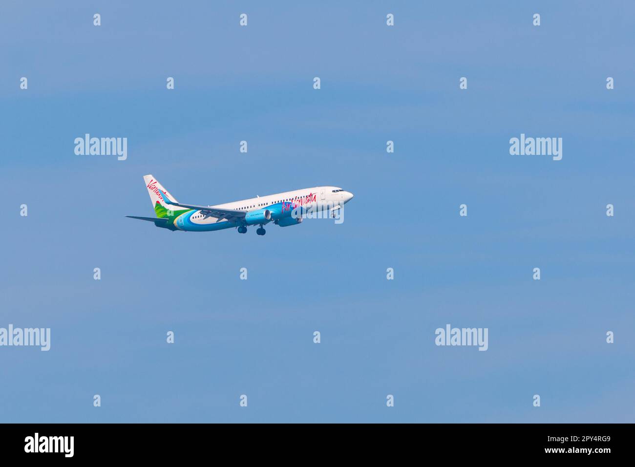 Aircraft movements at Sydney (Kingsford Smith) Airport in Sydney, Australia. Pictured: an Air Vanuatu jet approaching Sydney Airport. Stock Photo