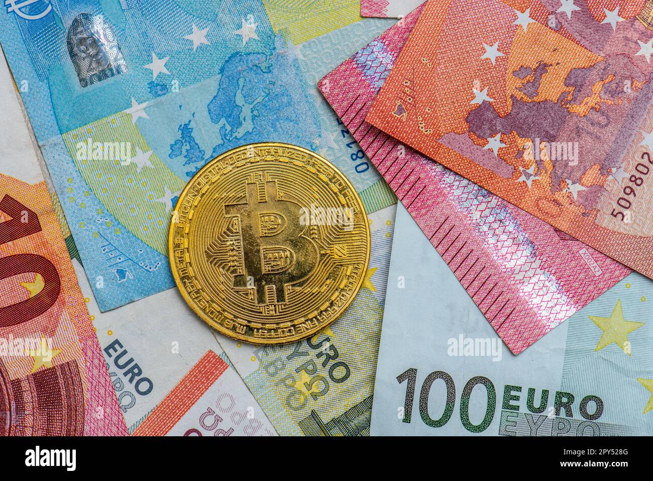 Gothenburg, Sweden - April 30 2022: Shiny golden Bitcoin placed on Euro  notes Stock Photo - Alamy