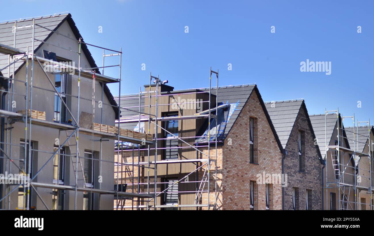 Terraced houses under construction. Housing estate development under construction Stock Photo