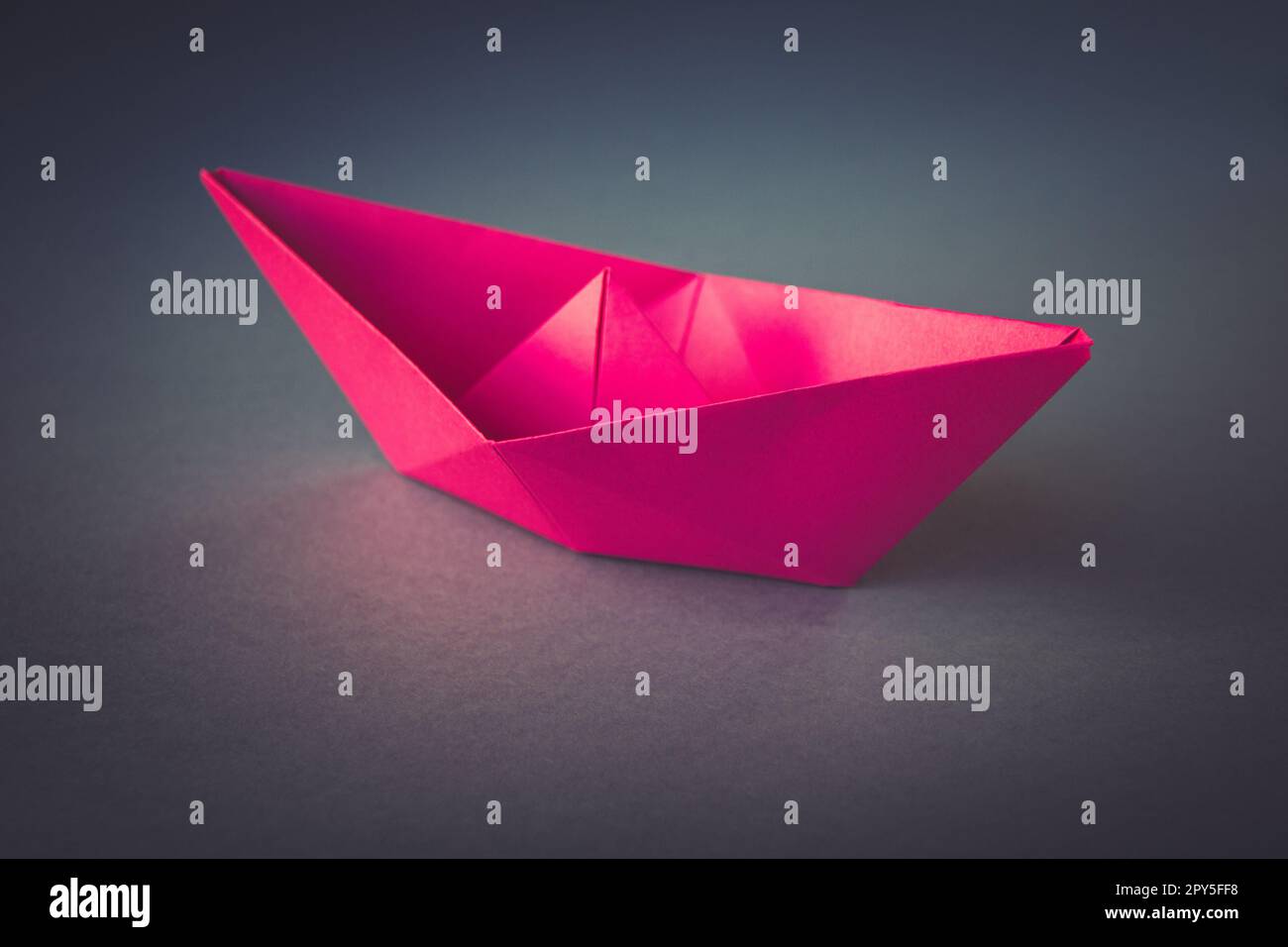 Pink toy boat hi-res stock photography and images - Alamy