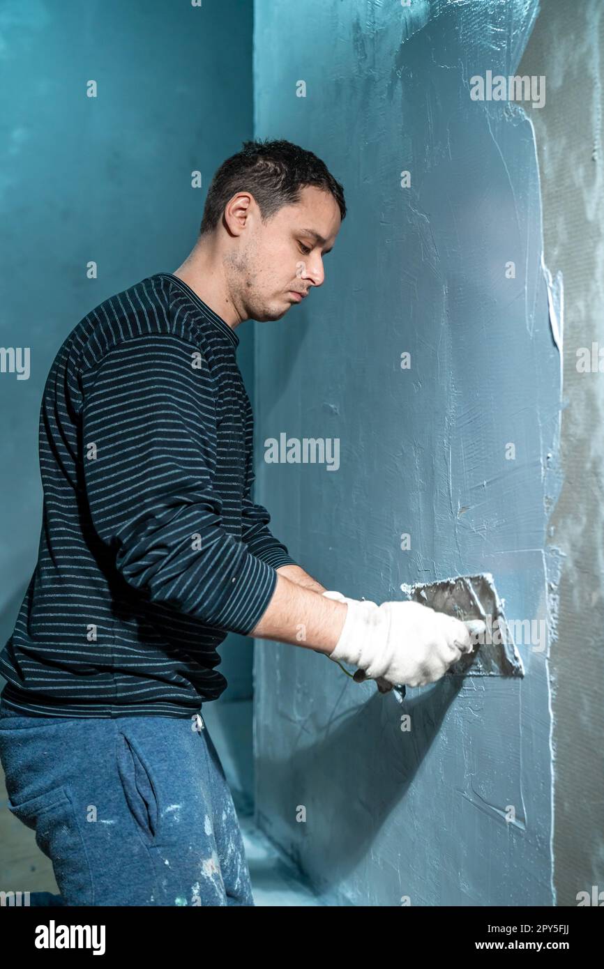 waterproofing of the wall under ceramic tiling Stock Photo Alamy