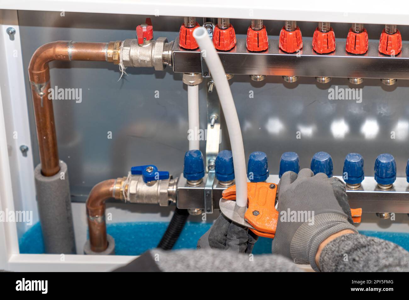 connecting the floor heating to the switchboard Stock Photo