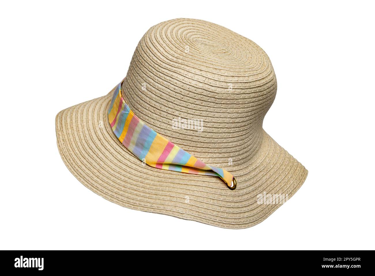 Straw hat isolated. Closeup of a elegant summer straw hat with colored ribbon for girls isolated on a white background. Clipping path. Travel and vacations concept. Holiday season. Stock Photo