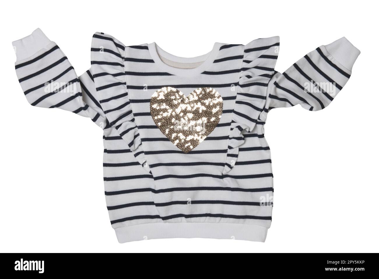 Spring children clothes. Close-up of a stylish beautiful black and white striped little girl sweater or pullover with a heart isolated on a white background. Clipping path. Kids winter or autumn fashion. Stock Photo
