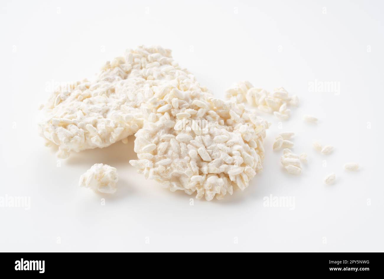 Rice malt placed against a white background. Koji mold. Stock Photo