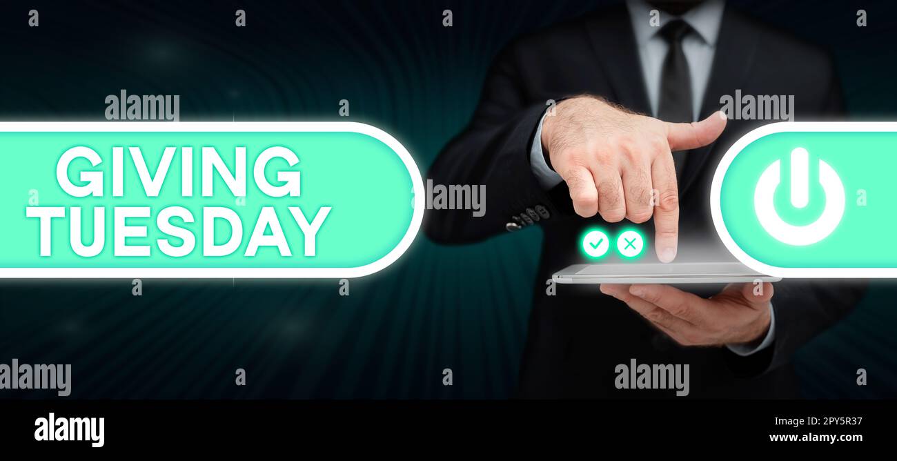 Sign displaying Giving Tuesday. Word for international day of charitable giving Hashtag activism Stock Photo